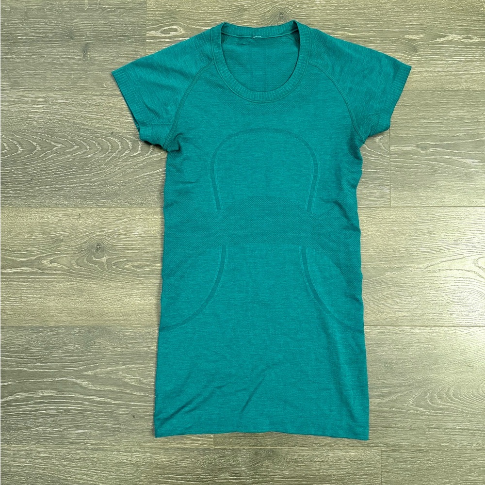 Lululemon Swiftly Tech size 4 deep emerald green